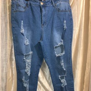 High waisted distressed jeans